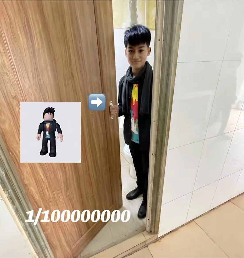 A photo of a boy in an outfit of one of Roblox’s default character, John, with the Roblox character himself being shown next to the boy as a comparison
